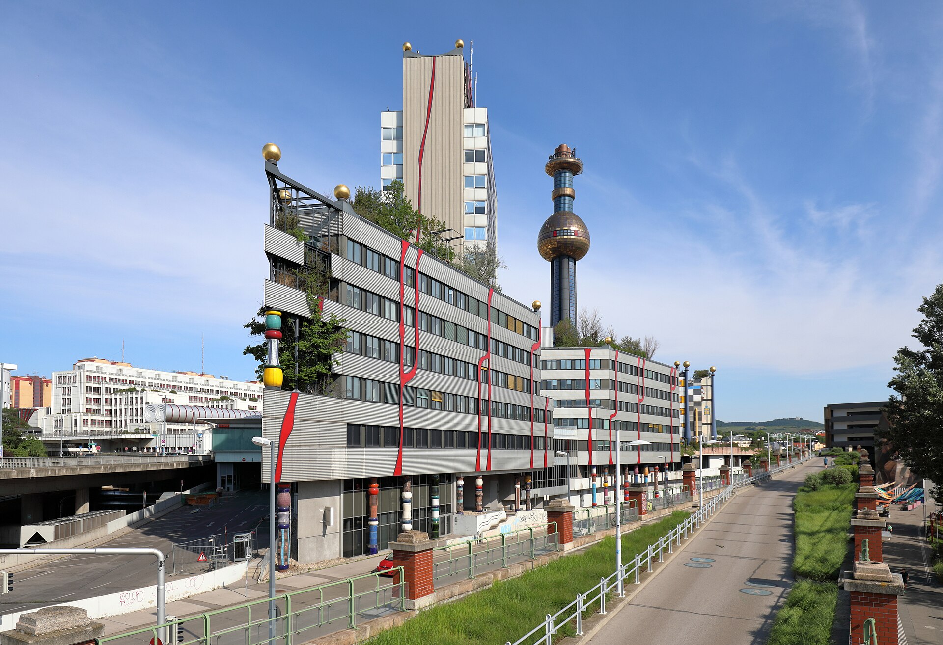 Hundertwasser Spittelau incinerator with gilded sphere chimney, Vienna