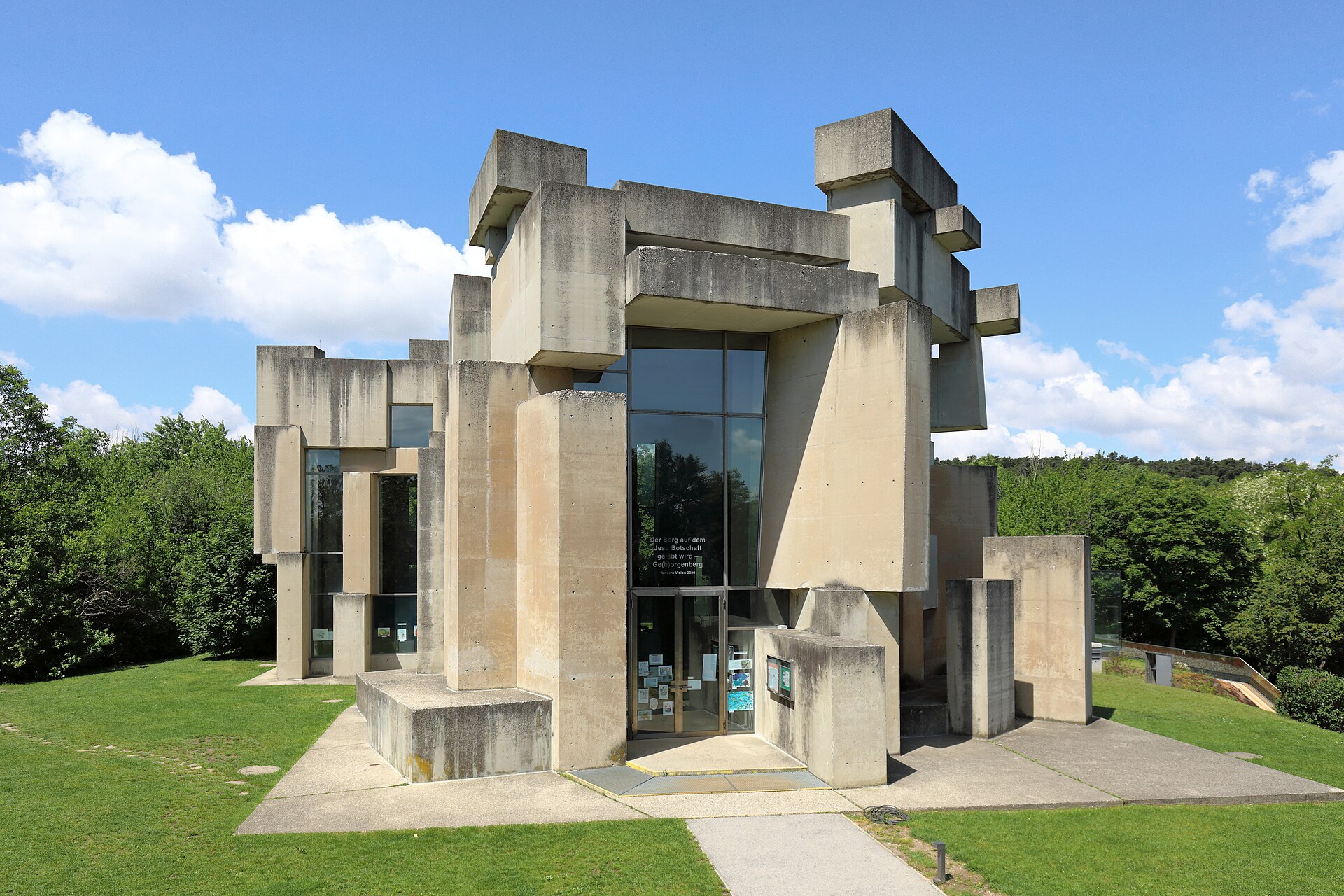 Wotrubakirche stacked concrete blocks against pine forest, Vienna 23rd district — photo guide by Best Alex Shots